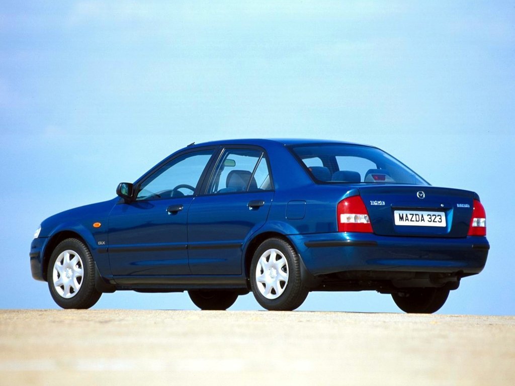 седан Mazda 323 1998 - 2000г выпуска модификация 1.3 MT (73 л.с.)