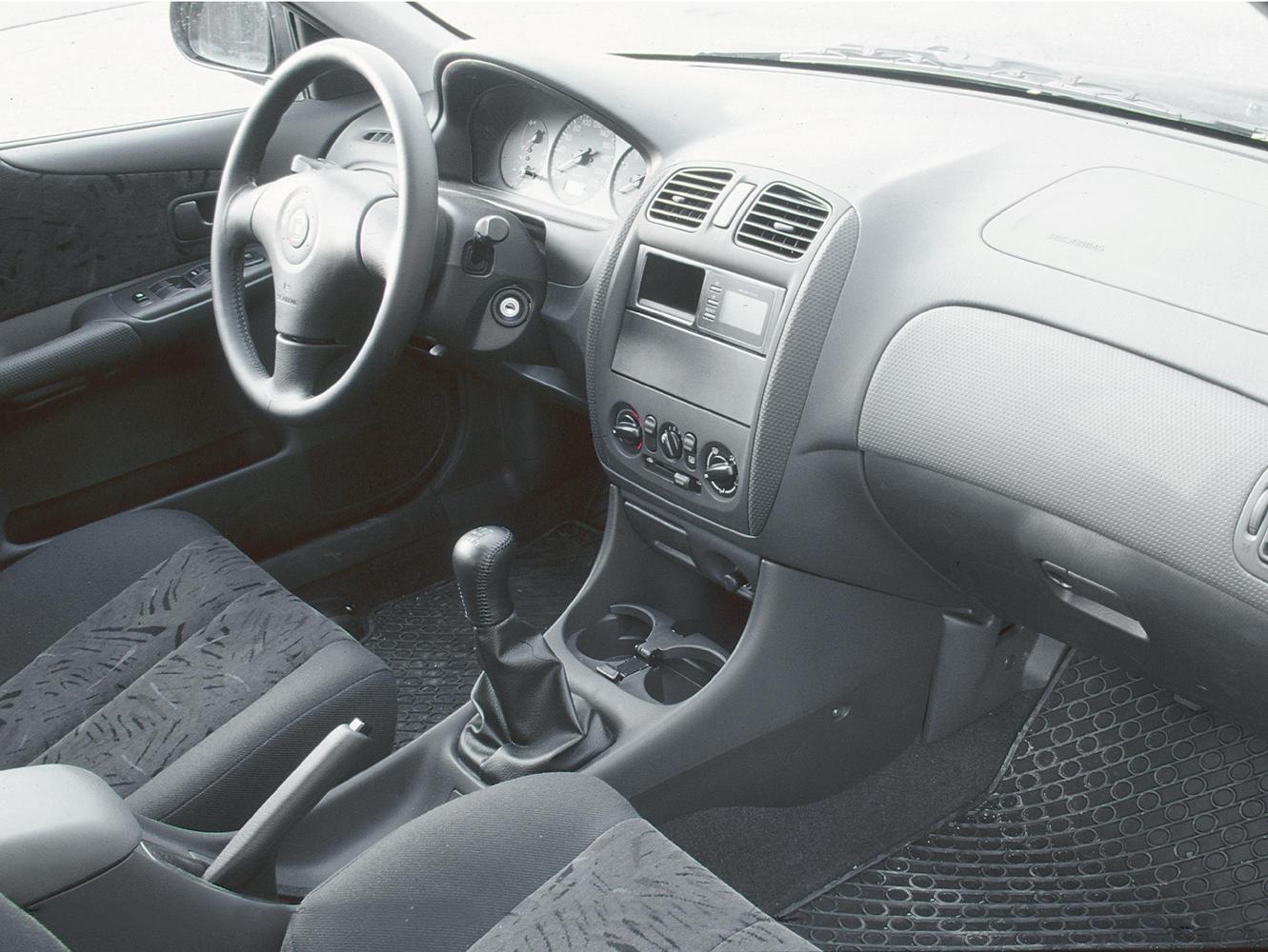 хэтчбек 5 дв. Mazda 323 1998 - 2000г выпуска модификация 1.3 MT (73 л.с.)