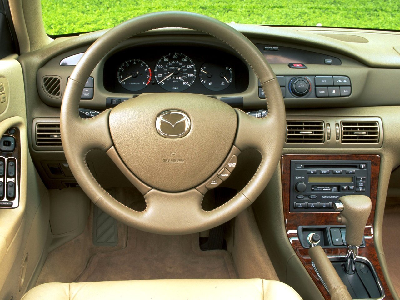 седан Mazda Millenia 1995 - 1999г выпуска модификация 2.0 AT (160 л.с.)