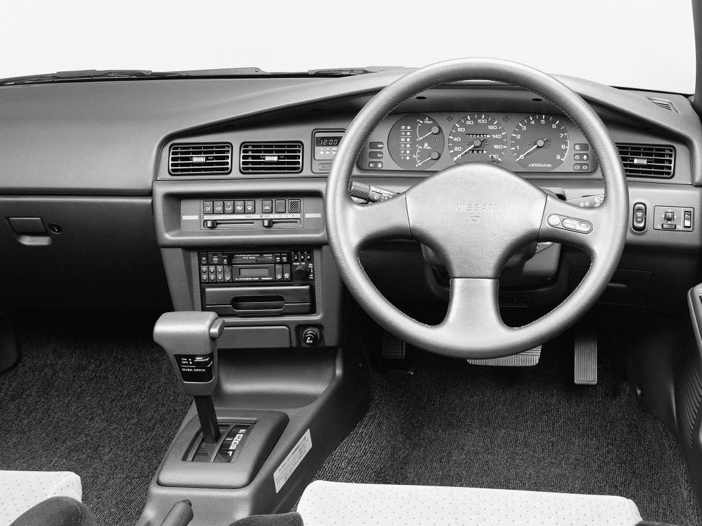 седан Nissan Bluebird 1987 - 1991г выпуска модификация 1.6 AT (79 л.с.)