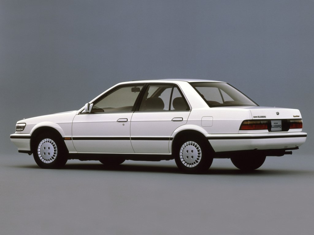 седан Nissan Bluebird 1987 - 1991г выпуска модификация 1.6 AT (79 л.с.)