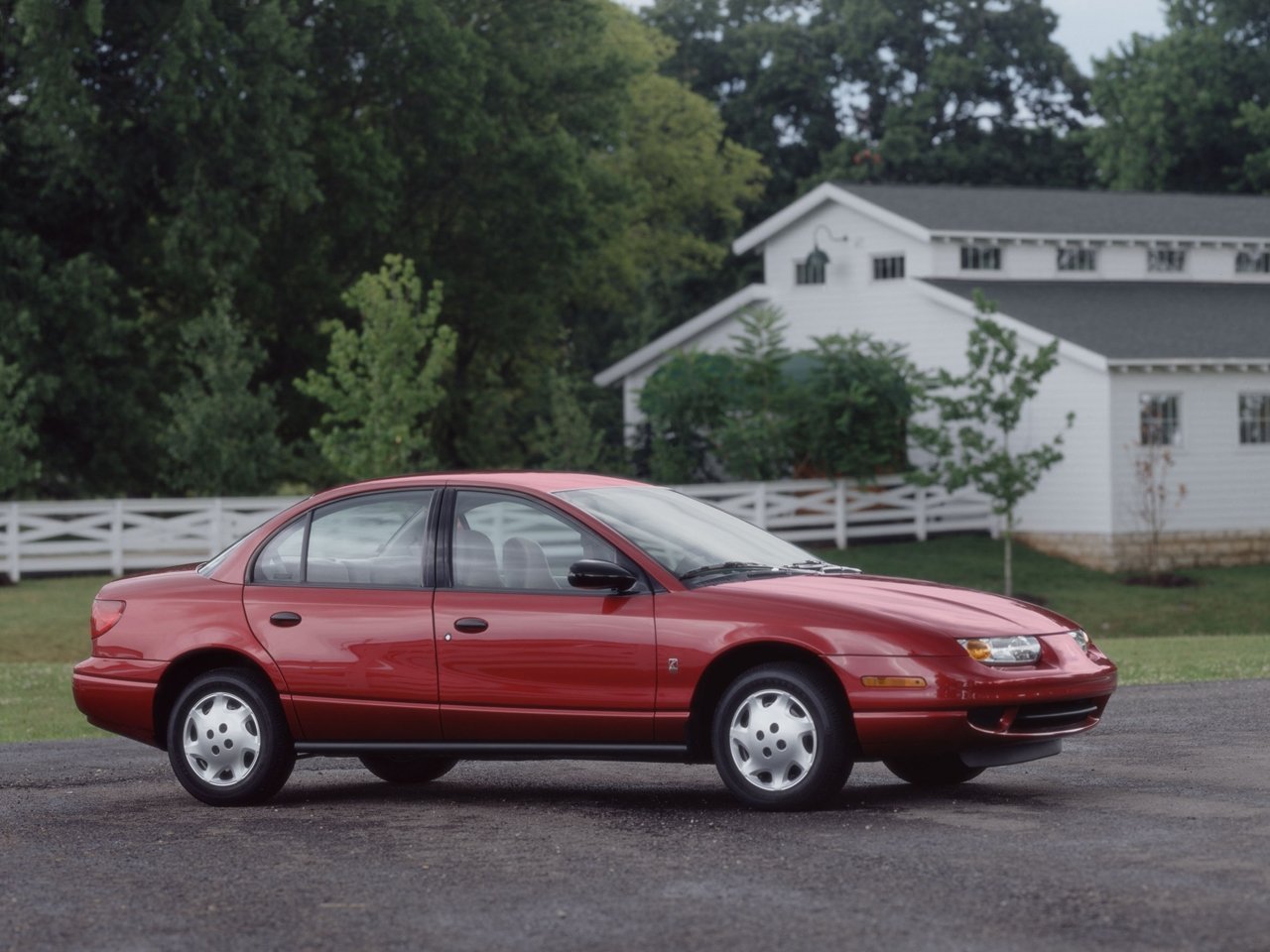 седан Saturn SL 1996 - 2002г выпуска модификация 1.9 AT (100 л.с.)