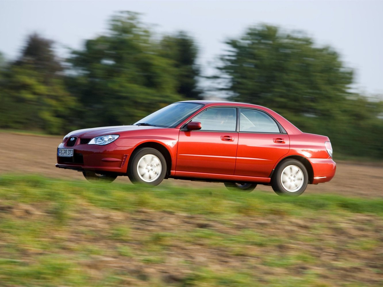 седан Subaru Impreza 2005 - 2007г выпуска модификация 1.5 AT (100 л.с.)