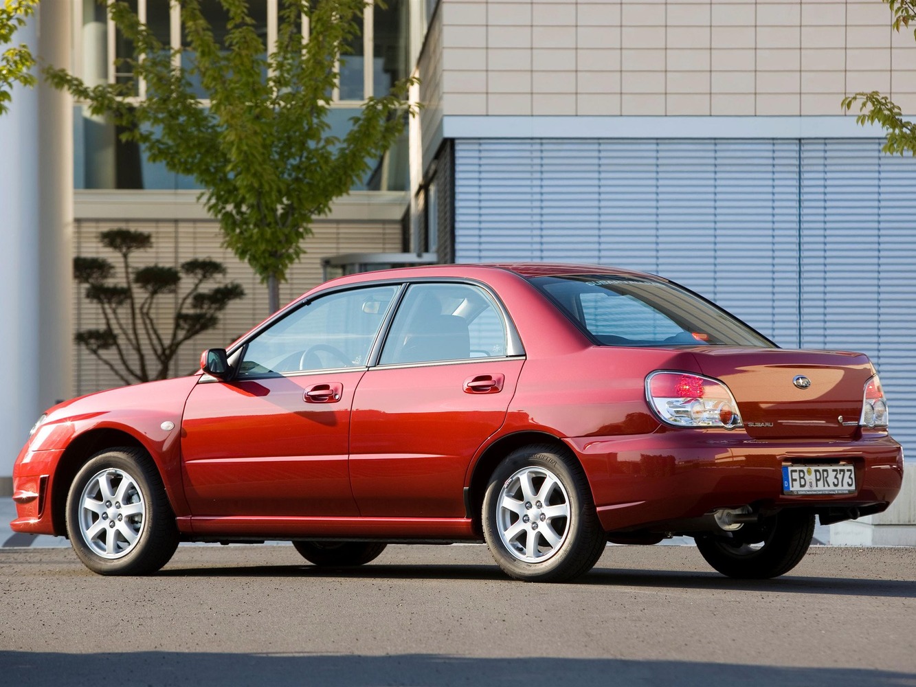 седан Subaru Impreza 2005 - 2007г выпуска модификация 1.5 AT (100 л.с.)